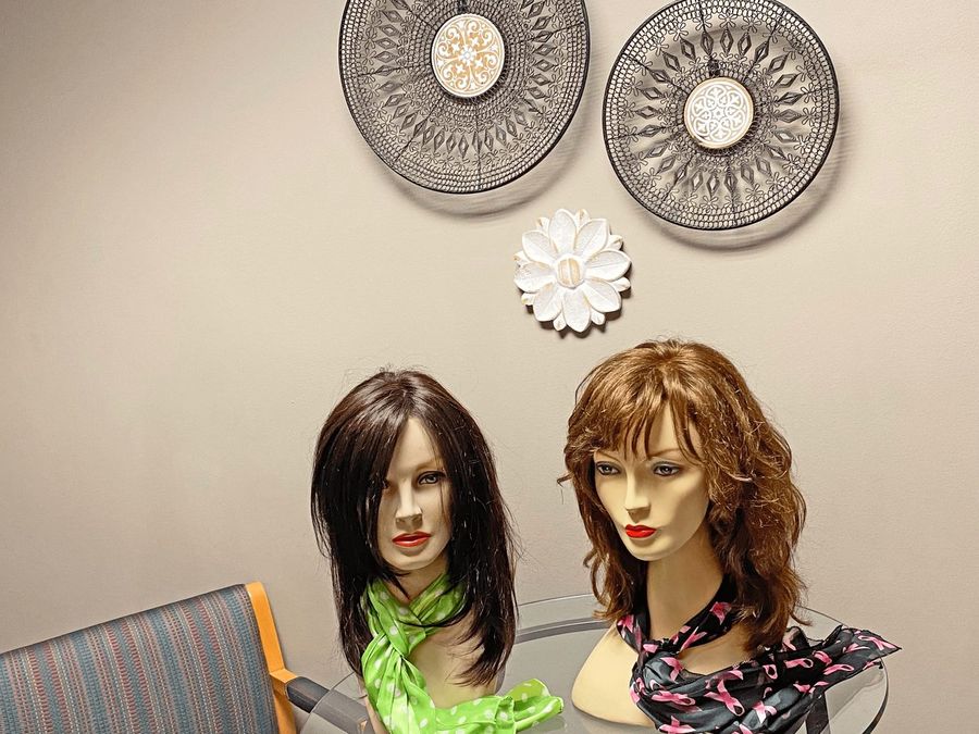 Styled wigs on display at the Hair Response studio